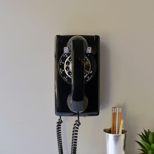 Rotary wall phone restored and working, black wall mount retro telephone