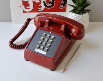 Red push button desk phone, restored and working touch tone telephone