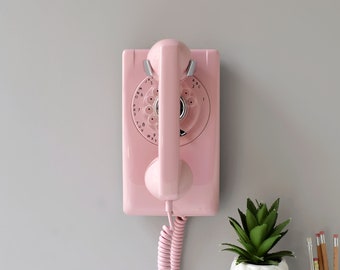 Pink rotary dial wall phone restored and working