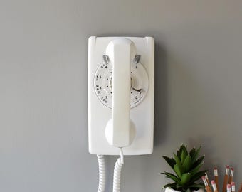 White rotary dial wall phone, restored and working