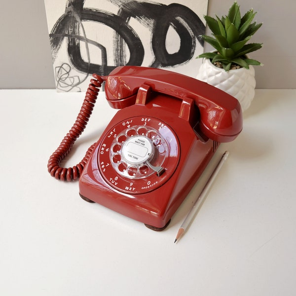Red rotary dial desktop telephone restored and working