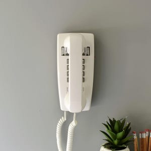 Retro touch tone wall phone in white, restored and working