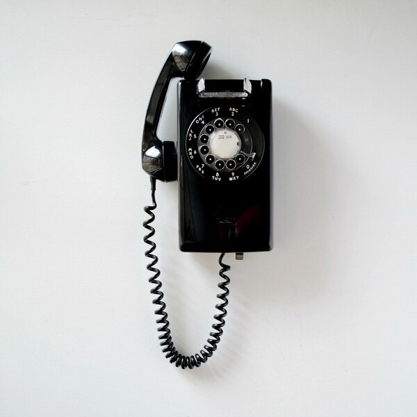 Vintage black rotary phone; rotary dial wall mount telephone; tested and working