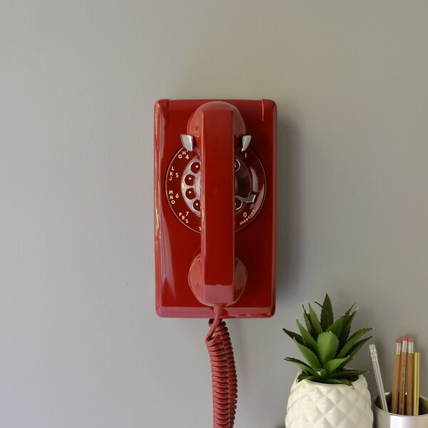 Red rotary dial wall phone restored and working