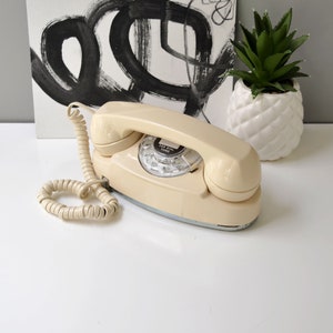 Rotary dial princess phone in beige, restored and working