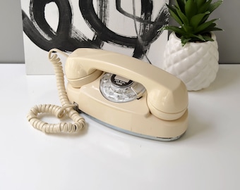 Rotary dial princess phone in beige, restored and working