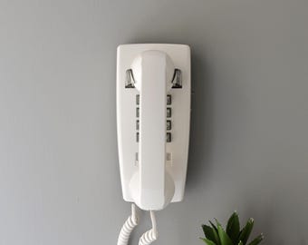 Retro touch tone wall phone in white, restored and working