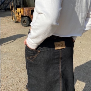 Authentic vintage 2000s Dolce and Gabbana denim black knee length skirt