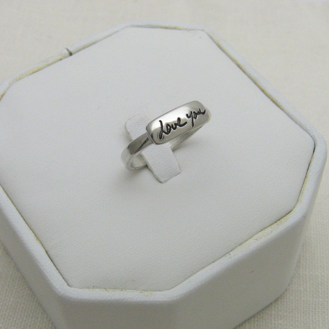foreign manuscript writing on my gold ring band foreign manuscript writing on my gold ring band