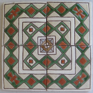 May include: Four square ceramic tiles with a geometric pattern in shades of green, brown, and white. The pattern features a central diamond shape with smaller diamonds and squares surrounding it.