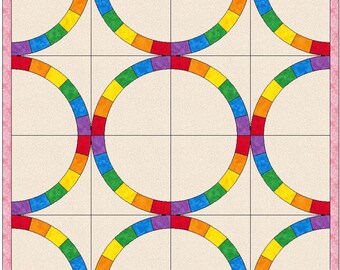 Puede incluir: Un bloque de colcha con un diseño de arcoíris. El bloque está formado por cuatro semicírculos, cada uno de un color diferente del arcoíris. Los semicírculos están dispuestos de forma que crean un patrón de estrella.
