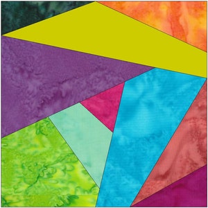 Può includere: Un blocco di trapunta patchwork colorato con forme geometriche in tonalità di verde, viola, blu, rosa e arancio.
