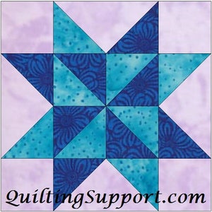 May include: A quilt block with a star design. The star is made up of blue and teal triangles, with a light purple background.