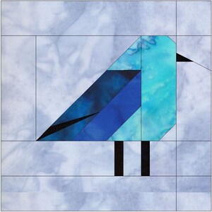 May include: A blue and black geometric bird quilt block with a light blue background.