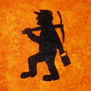 May include: A black silhouette of a person carrying a pickaxe and a lantern on an orange background.