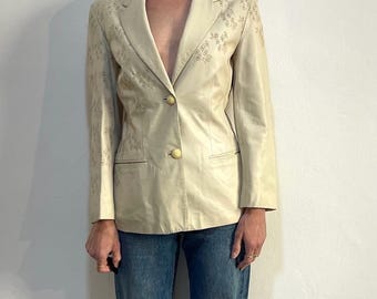 Blazer de cuero beige de Gianni Versace de los años 90 con estampado floral cortado a láser