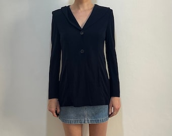 May include: A navy blue blazer with a long sleeve, a v-neck, and a single button closure.