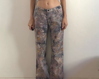 Jeans a zampa con stampa a margherite, stile hippy vintage, stile Cavalli anni '90, con brillantini argentati