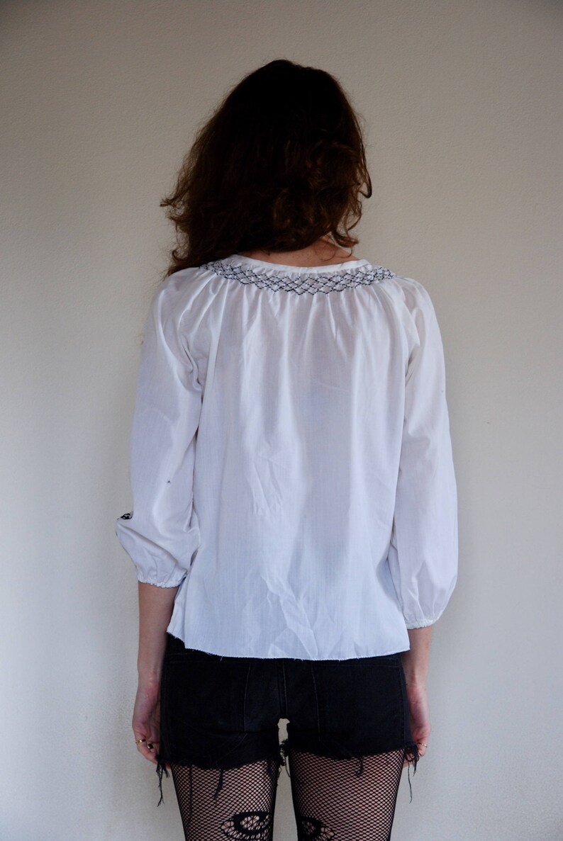 smocked white shirt
