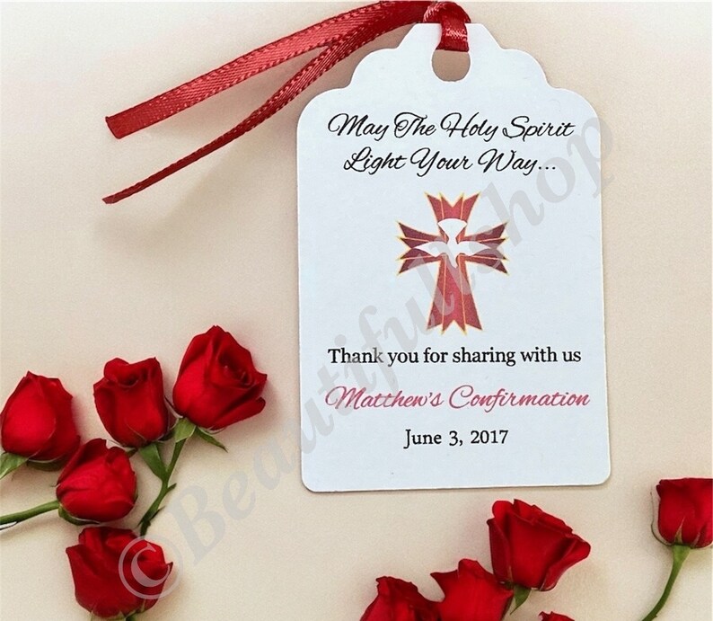 May include: White favor tag with a red cross and dove design. The text reads "May The Holy Spirit Light Your Way... Thank you for sharing with us Matthew's Confirmation June 3, 2017".