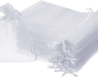 May include: A stack of white sheer organza gift bags with drawstrings. The bags are made of a delicate, translucent fabric and are perfect for packaging small gifts or favors.