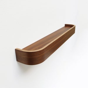 Rounded walnut shelf