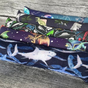 May include: Five colorful catnip toys with different space-themed designs. The toys are made of soft fabric and have a variety of colors, including blue, green, purple, and orange. The toys are all about 10 inches long and are perfect for cats of all sizes.