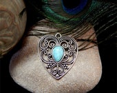 Antique Burnished Silver Open Filigree Designed Heart With Inlaid Turquoise Howlite Teardrop Stone