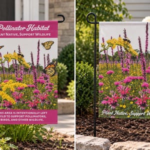 May include: Two garden flags on black metal stands. The left flag is pink and white with text reading Pollinator Habitat, Plant Native, Support Wildlife, and a description of the area. The right flag features a meadow with butterflies and flowers.
