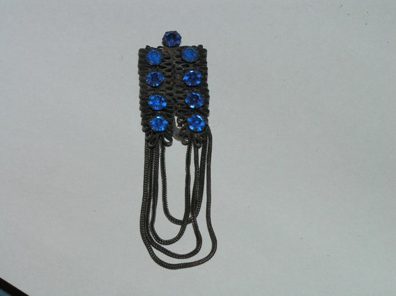 A Vintage Blue and Black Clothing Clip - image 2
