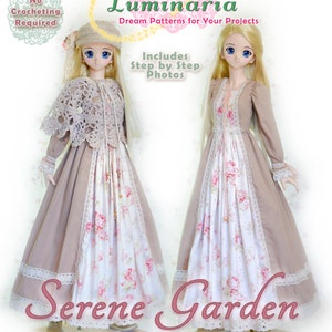 May include: Two dolls wearing long, flowing dresses with floral patterns and lace trim. The dresses are in shades of tan and white. The image includes text that reads "Luminaria Dream Patterns" and "Serene Garden Sewing Pattern for Volks Dollfie Dream 1/3 BJD."