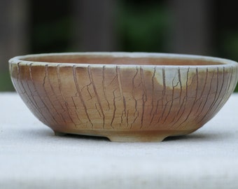 Hand thrown stoneware wood-fired round bonsai pot with cracks