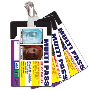 May include: A set of "Multi Pass" cards featuring images of two women and detailed text. The cards display names like Leeloo Dallas and Korben Dallas, personal data, and a "Visa" logo. The cards are held together by a metal clip.