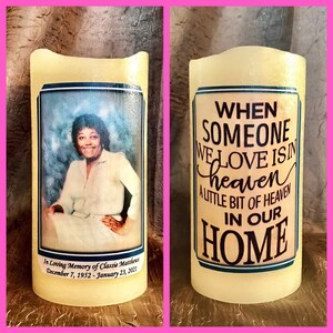 May include: A white pillar candle with a photo of a woman and the text "In Loving Memory of Classic Matthews December 7, 1952 - January 23, 2021". The other side of the candle has the text "When someone we love is in heaven, a little bit of heaven is in our home."