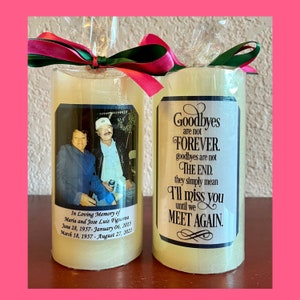 May include: Two white memorial candles with a photo of two people and a message that reads "Goodbyes are not FOREVER. Goodbyes are not THE END. They simply mean I'll miss you until we MEET AGAIN."