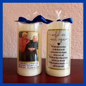 May include: Two ivory pillar candles with personalized labels. The left candle has a photo of an older couple and the text "In Loving Memory of Mam & Pap July 25, 1930 - December 2, 2020 March 20, 1933 - November 20, 2020". The right candle has the text "until we meet again" with a poem about remembering loved ones.