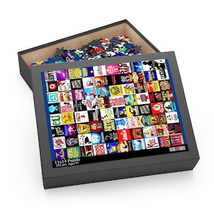 May include: A 252-piece jigsaw puzzle featuring a collage of Broadway show logos. The puzzle is 11 inches by 14 inches and is recommended for ages 9 and up.