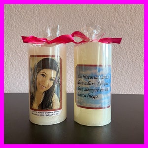 May include: Two white pillar candles with personalized labels. One candle features a photo of a woman and the text "In Loving Memory of Mirian November 24, 1990 - February 1, 2023". The other candle features the text "La historia nunca dice adios. Lo que dice siempre es un hasta luego."