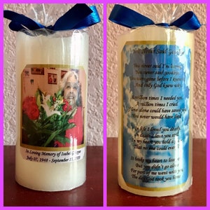 May include: A white memorial candle with a blue ribbon and a photo of a woman with flowers. The text on the candle reads "In Loving Memory of Isabel G. July 07, 1948 - September 15, 2020". The other side of the candle has a poem that reads "You Never Said Goodbye".