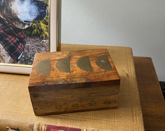 Small wooden box with metal accents