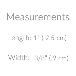 May include: Measurements for a small item: 1 inch (2.5 cm) long and 3/8 inch (0.9 cm) wide.