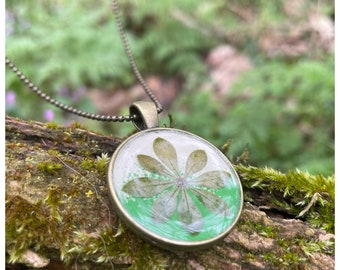 Forest spirit necklace | round pendant | real woodruff leaf | bronze colored | color mix