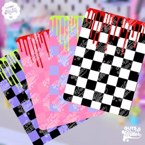 May include: Four colourful checkerboard patterned stickers with dripping paint accents. The stickers feature a black and white checkerboard pattern with pink, purple, green, and red paint dripping down the sides. The stickers are labelled "GUTS & GLITTER".