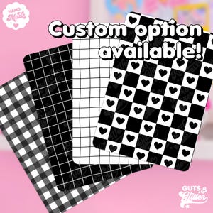 May include: Three black and white patterned sheets of paper with the text "Custom option available!" in a white bubble. The patterns are gingham, grid, and checkerboard with hearts.