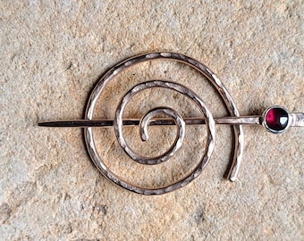 Bronze Spiral Shawl Pin set with a Garnet.