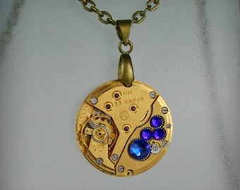 Gold Watch movement  Steampunk   Pendant with  Capri Blue  Crystal  ,  Steampunk Jewelry , Clockwork Watch Movement Pendant