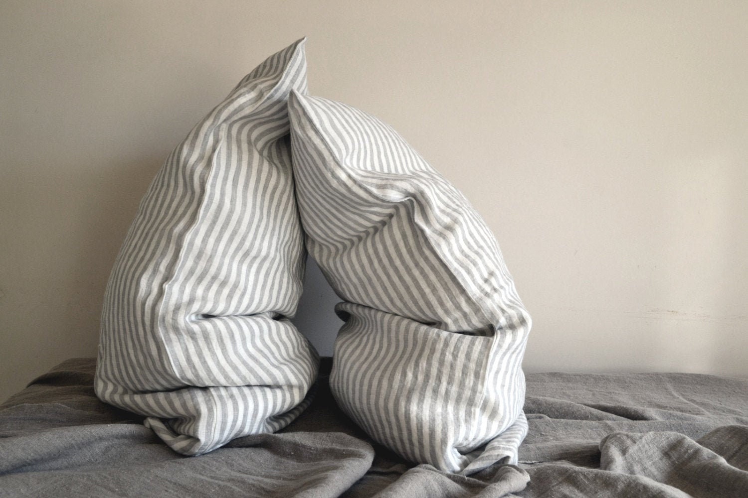 Pinstriped Grey and White stonewashed natural linen pillowcase. Stand…