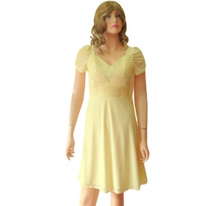 Dress With Sleeves. Light Yellow Dress.