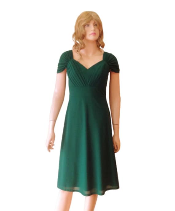Dark green knee store length dress