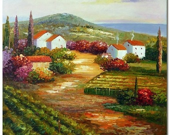 May include: A painting of a rural landscape with white houses, a winding road, and a vineyard in the foreground. The sky is a soft blue with pink and purple clouds. The houses have red tile roofs and are surrounded by green trees and bushes.